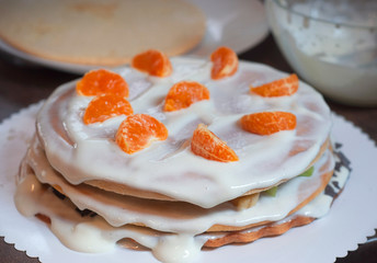 Homemade cake with honey, decorate slices of orange