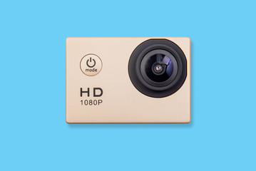 HD action camera isolated on blue background