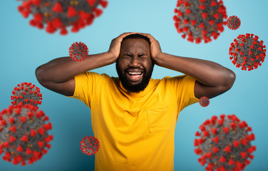 Sad and desperate expression of a boy who is scared to catch the covid-19 coronavirus. Cyan...