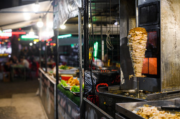 Showcase of street food truck with bbq meat