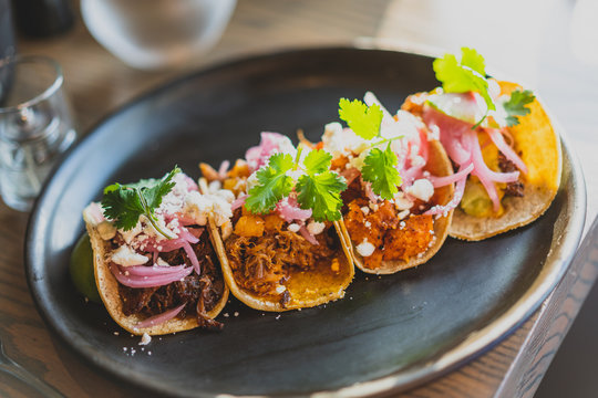plate of colorful mexican street tacos
