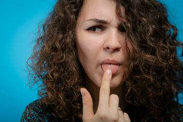 Woman showing tongue