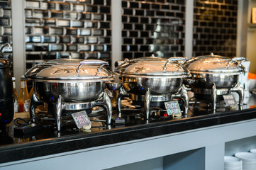 Buffet Table with Row of Food Service Steam Pans