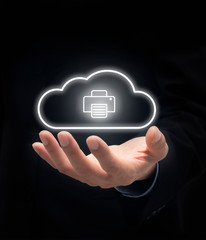 Businessman holding a cloud connected print icon Cloud printing Concept