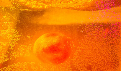 Pretty fruits shot underwater