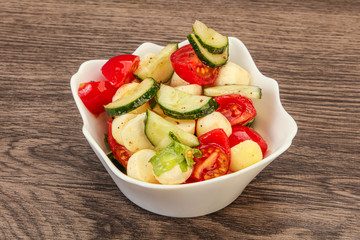 Salad with vegetables and mozzarlla
