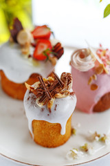 appetizing Easter cake decorated with nuts chocolate and fruit. Easter