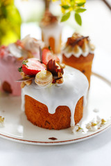 appetizing Easter cake decorated with nuts chocolate and fruit. Easter