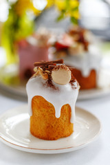 appetizing Easter cake decorated with nuts chocolate and fruit. Easter