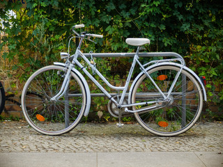 Fototapeta na wymiar Old classic vintage bicycle parked