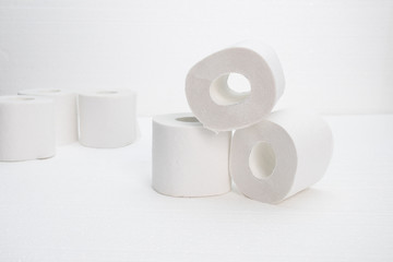 Hygiene and cleanliness. Rolls of toilet paper on a white background