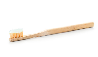 Tooth brush with paste on white background