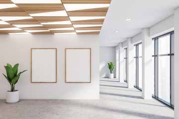 Empty white office hall with posters - obrazy, fototapety, plakaty