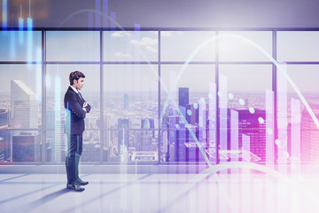 Man in panoramic office, digital graph