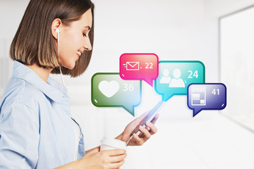 Smiling girl with smartphone, social media icons