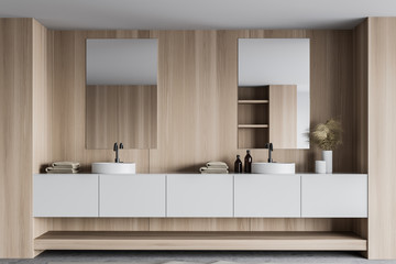 Double sink in white and wooden bathroom