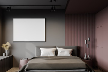 Red and gray bedroom interior with poster