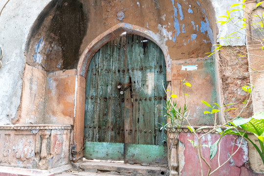 an ancient door at naughara in the chandni chowk district of old delhi