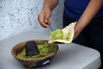 preparado guaca mole con cebolla y picante
