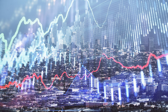 Forex chart on cityscape with skyscrapers wallpaper double exposure. Financial research concept.