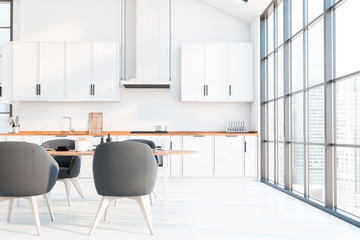 Panoramic white kitchen, countertops and table