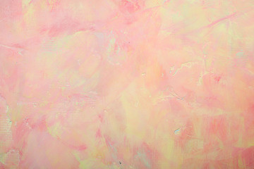 Wall with pink and yellow texture