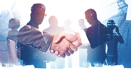 Handshake in city, business partnership