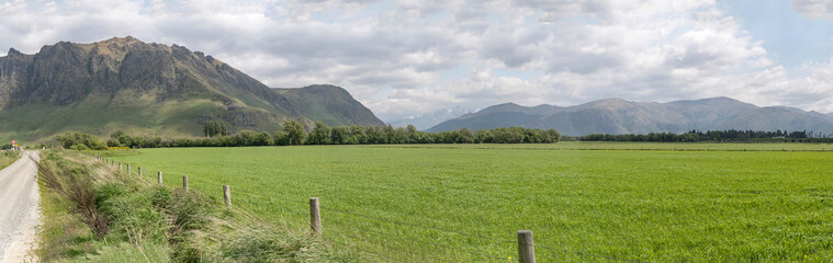 Fototapeta na wymiar Castle Hill and Trotters Plain in green countryside, near Fairlight, New Zealand