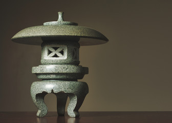 Japanese stone lantern with gray background