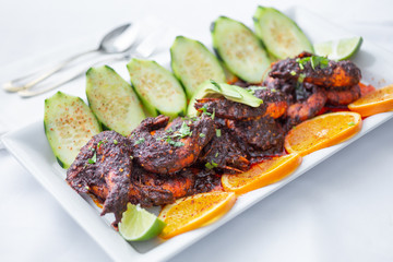 A view of a Mexican dish known as camarones a la cucaracha, in a restaurant or kitchen setting.