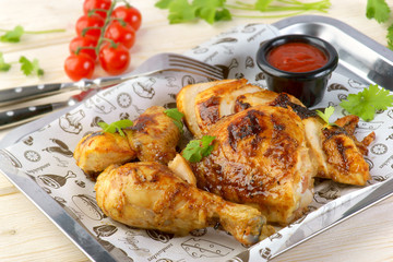 grilled chicken with barbecue sauce on a wooden background