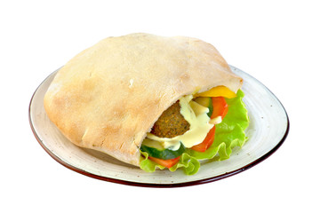 pita with falafel and vegetables isolated on a white background