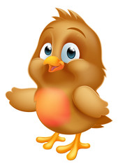 A robin Christmas cartoon baby bird mascot pointing with its wing