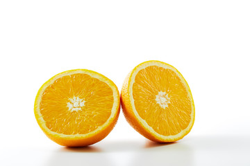 fresh orange fruit half isolated on white