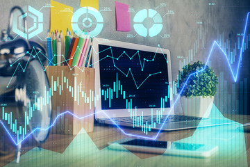 Multi exposure of graph and financial info and work space with computer background. Concept of...