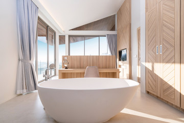 Interior design of round bathtub in modern bathroom of pool villa, house, home, condo and apartment