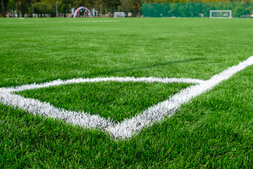 empty stadium with artificial football pitch