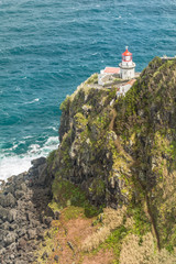 Fototapeta na wymiar Lighthouse Ponta do Arnel in Sao Miguel island Azores