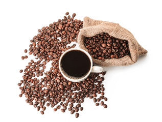 Cup of hot coffee and beans on white background