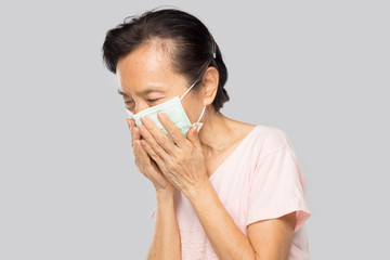 old asian woman feel have fever and sick
