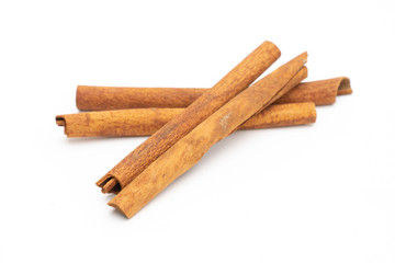 cinnamon sticks isolated on white