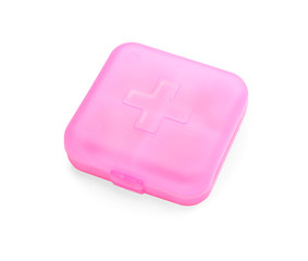 Container with pills on white background