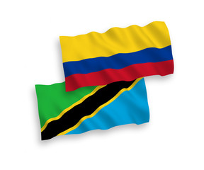 Flags of Tanzania and Colombia on a white background