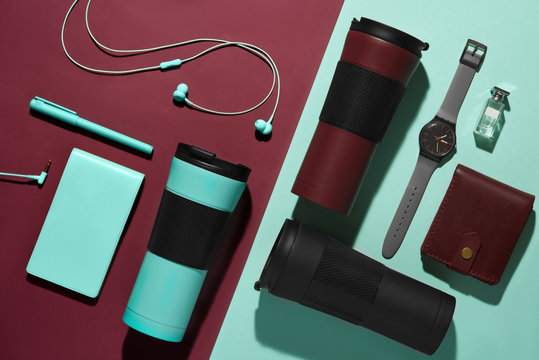 Men's accessories, devices and portable thermos mug.  Lifestyle and environmental consiousness concept. Flat lay, top view