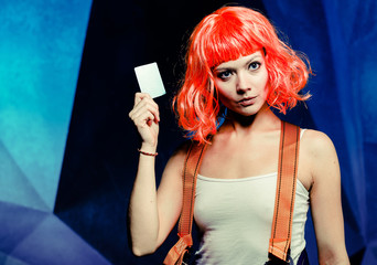 Sci-fi girl on the futuristic background. Lady showinga pass