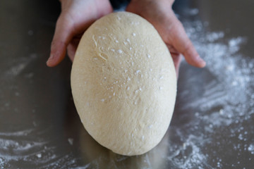 artisanal baking: hand kneading dough