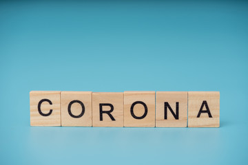 Corona Virus infection concept. Letter of wooden blocks