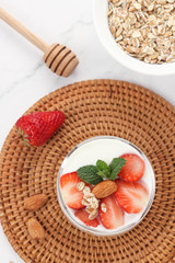 a cup of yogurt on the table

