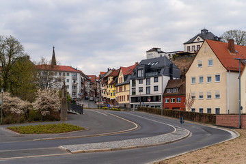 03.04.2020. Town Aschaffenburg, northwest Bavaria, Germany. Street with colorful houses of the old...