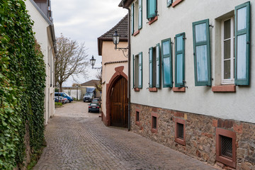 Fototapeta na wymiar 03.04.2020. Town Aschaffenburg, northwest Bavaria, Germany. Street with colorful houses of the old city at summer day. Tourist attraction. Concept of travel, tourism